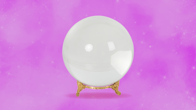 White crystal ball on golden stand