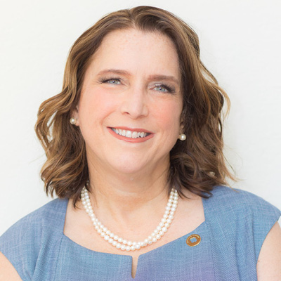 Headshot of Janet Driscoll Miller